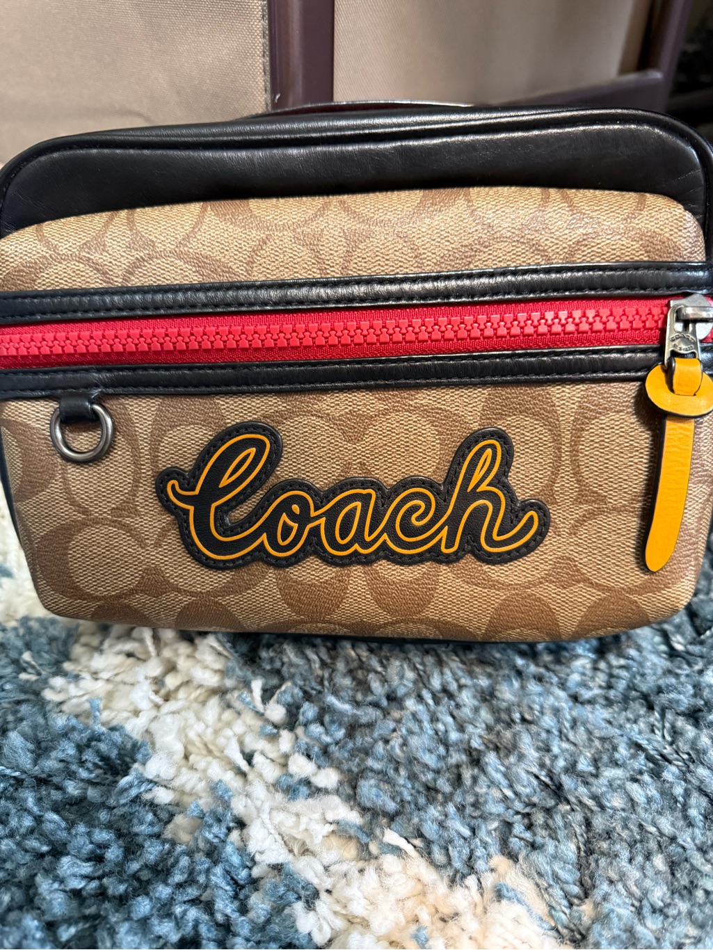 Coach Tan Signature Canvasclutch Bag With Red Zipper & Yellow Pull